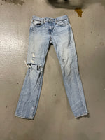 Levi knee hole jeans